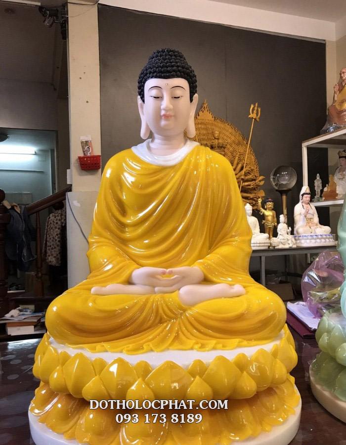 Tượng Phật Thích Ca tịnh tâm bằng bột đá hổ phách vàng đế sen cao 68cm